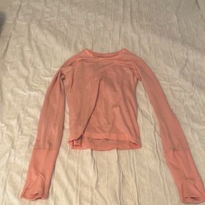 Lululemon long sleeve swiftly tech size 4 color is dew pink there is small hole